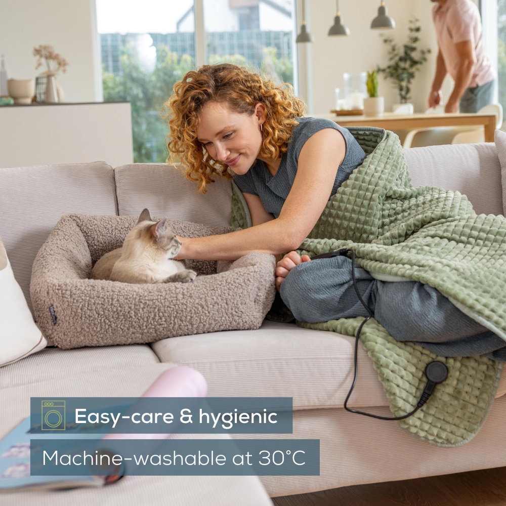 Beurer HD 72 Waffle Sage Green Heated overblanket; Soft and cuddly surface; Machine-washable at 30°C; 3 temp. settings; 1.7kg. Lightweight blanket